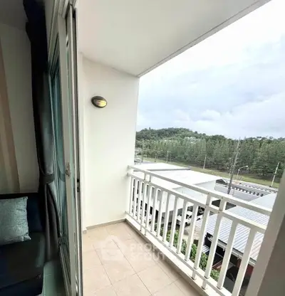 Charming balcony with scenic view, perfect for relaxation and enjoying the outdoors.