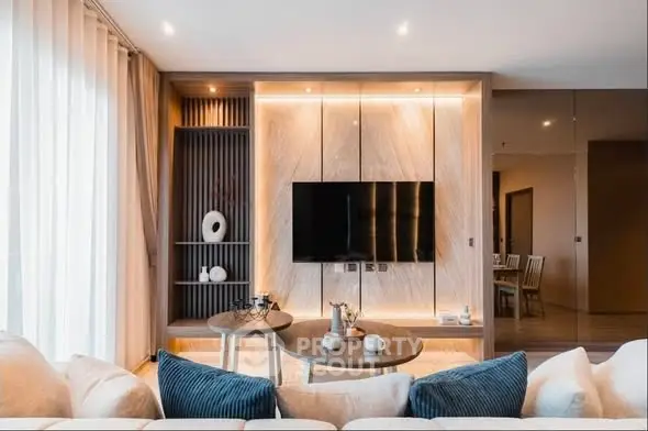 Luxurious modern living room with elegant decor and ambient lighting