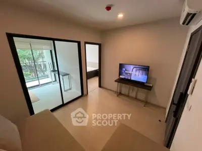 Modern living room with balcony view and sleek interior design