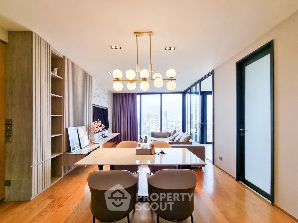 Luxurious modern living room with city view, elegant lighting, and stylish decor.