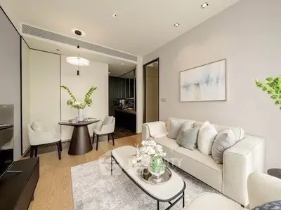 Elegant living room with modern decor and cozy seating area, perfect for relaxation and entertaining.