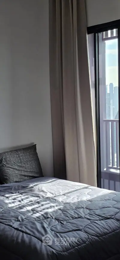 Modern bedroom with city view and elegant decor