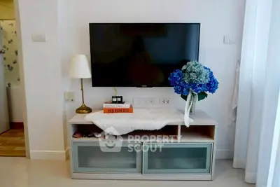 Stylish living room with modern TV setup and elegant decor