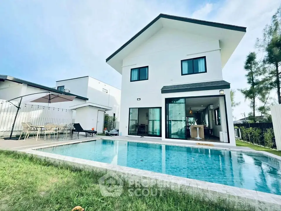 Stunning modern house with private pool and spacious outdoor area, perfect for luxury living.