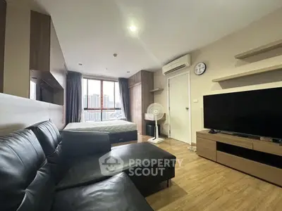 Modern studio apartment with sleek design and city view