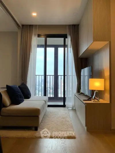 Modern living room with city view, cozy sofa, and stylish decor in high-rise apartment.
