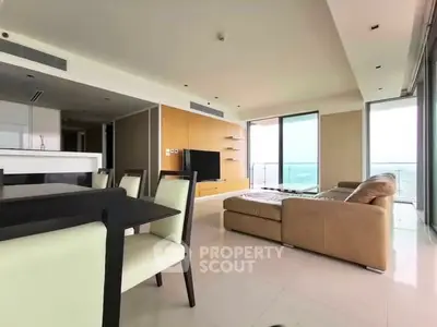 Spacious modern living room with panoramic views and elegant furnishings