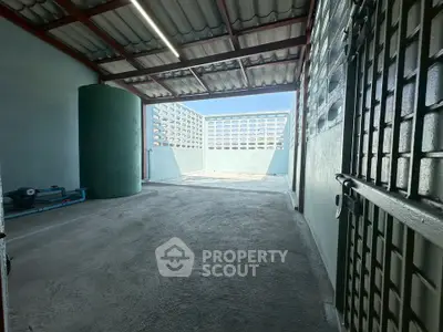 Spacious industrial-style storage unit with open layout and ample natural light.