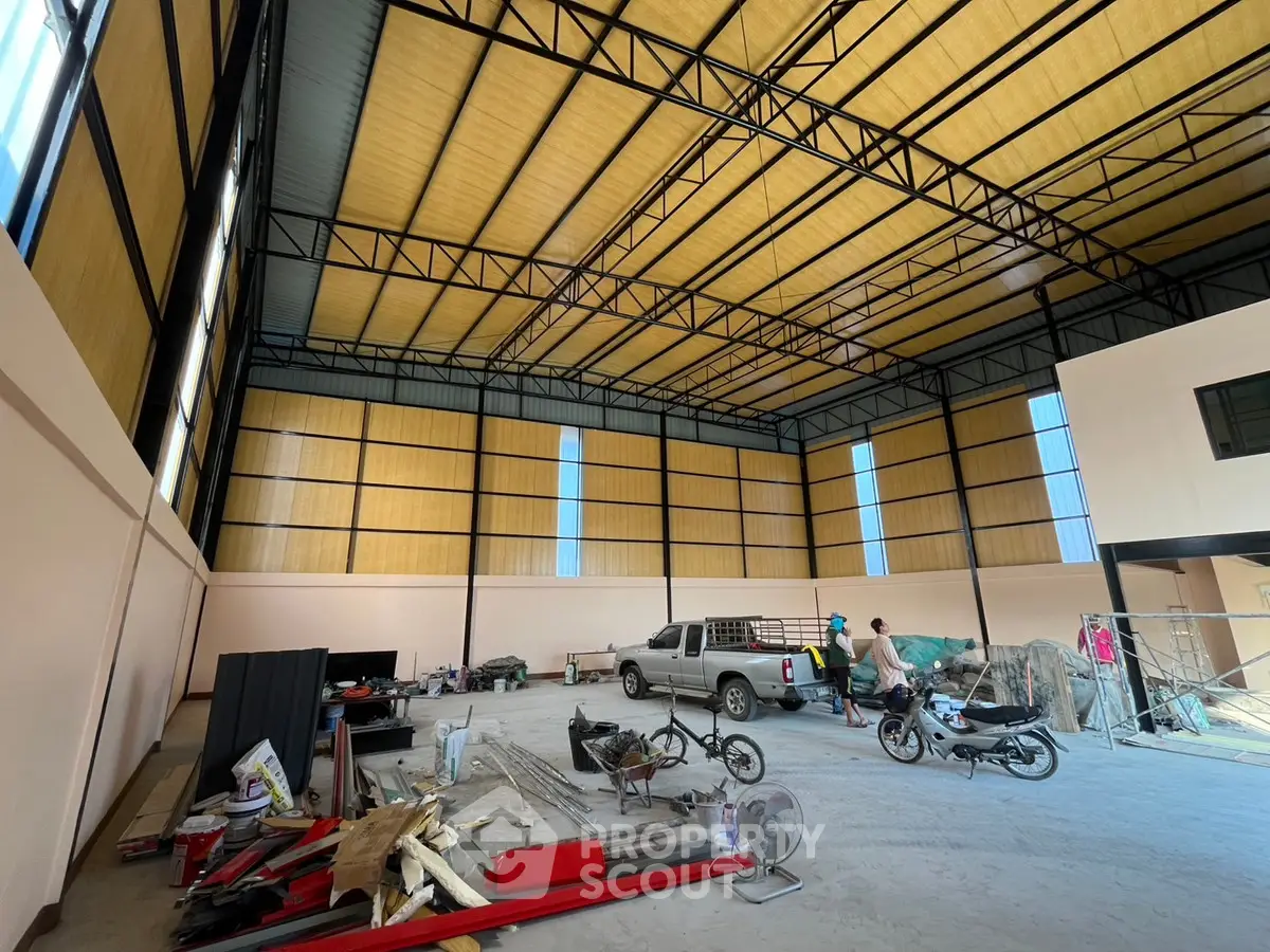 Spacious industrial warehouse with high ceilings and ample storage space