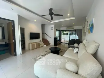Spacious modern living room with cozy sectional sofa and stylish decor