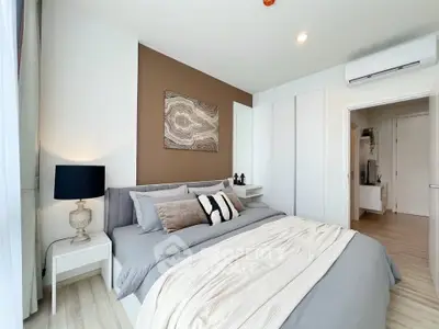 Modern bedroom with stylish decor and cozy ambiance