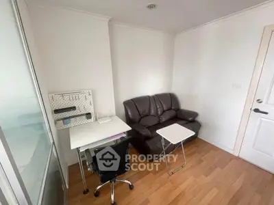 Cozy study room with leather sofa and modern desk setup