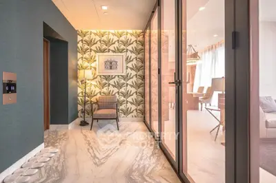 Luxurious interior with elegant marble flooring and stylish decor in a modern living space.