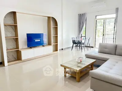 Spacious modern living room with sleek furniture and natural light