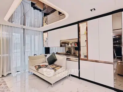 Luxurious modern living room with elegant decor and plush seating