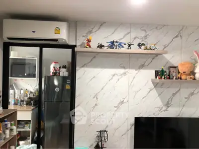 Modern living room with marble accent wall and stylish shelving
