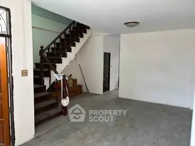 Spacious interior with staircase and open layout, ideal for customization.