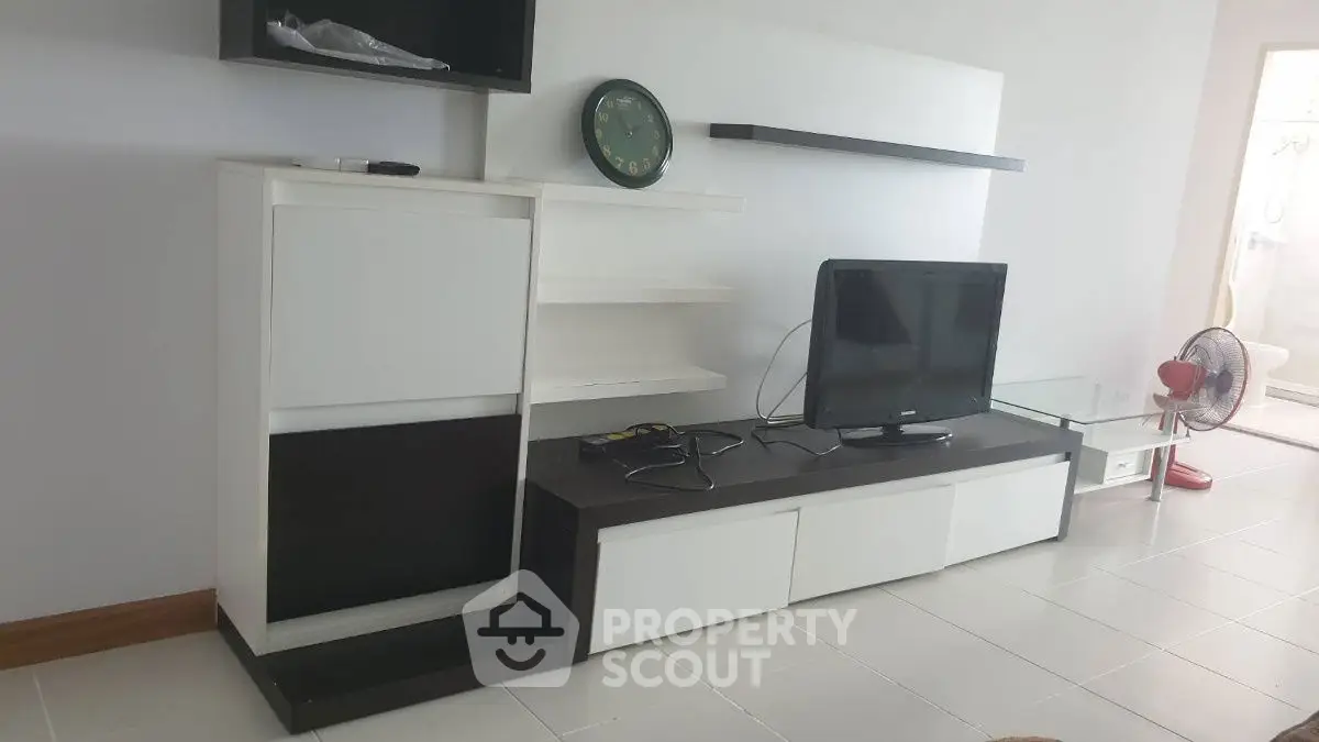 Modern living room with sleek TV stand and minimalist decor