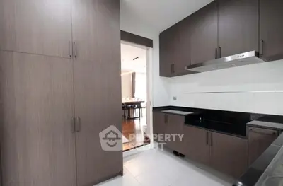 Modern kitchen with sleek cabinetry and open layout design