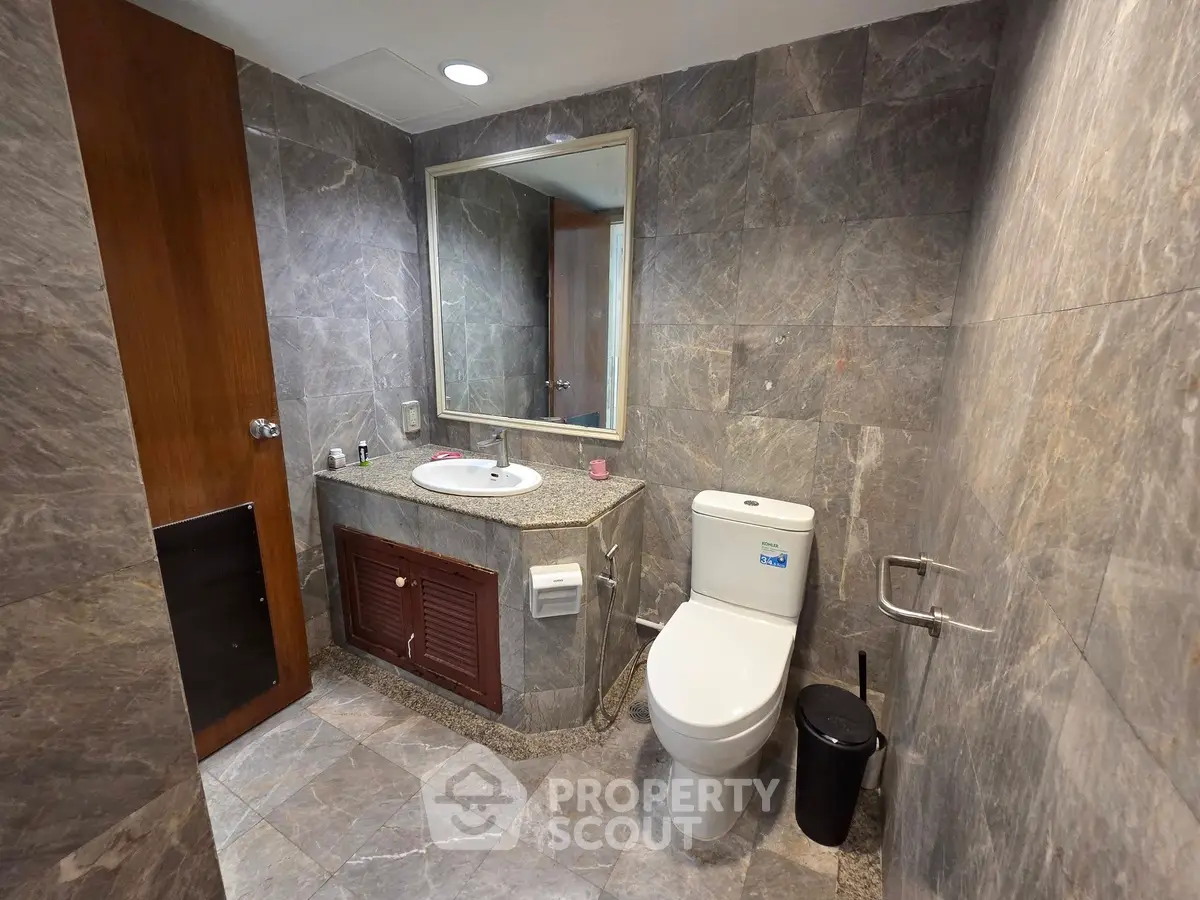 Luxurious marble bathroom with modern fixtures and elegant design