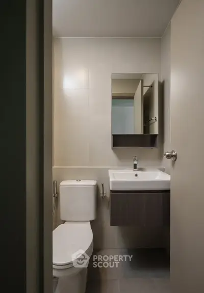 Modern minimalist bathroom with sleek fixtures and neutral tones