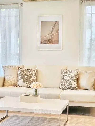 Elegant living room with stylish decor and natural light