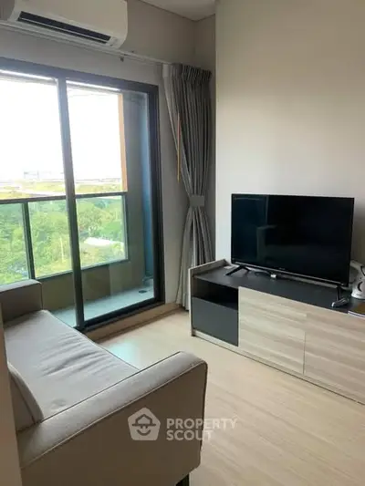 Modern living room with balcony view and sleek furniture