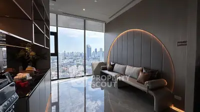 Luxurious modern living room with stunning city skyline view and elegant decor.