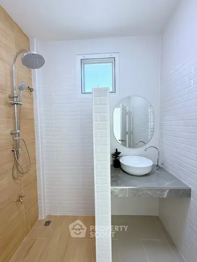 Modern bathroom with sleek shower and stylish sink area