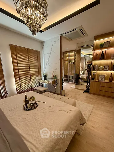 Luxurious bedroom with elegant decor and modern lighting