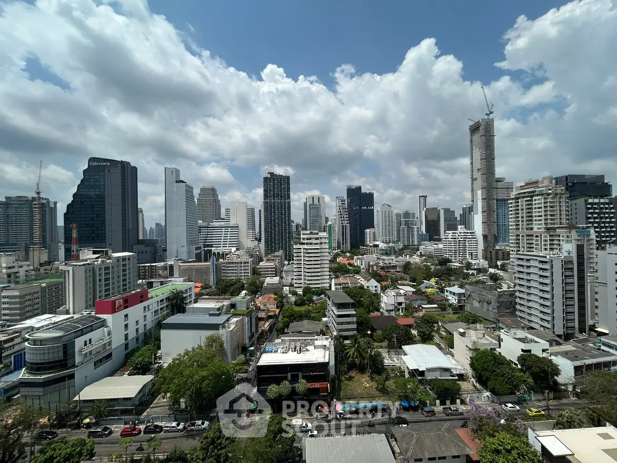 Stunning cityscape view showcasing modern skyscrapers under a vibrant blue sky.