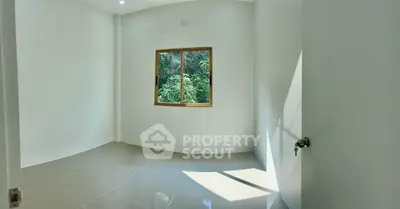 Bright empty room with large window and glossy tiled floor