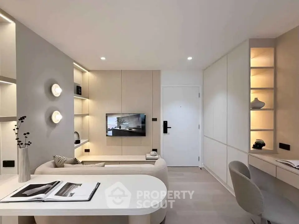 Modern living room with sleek design, built-in shelves, and cozy seating area, perfect for urban living.
