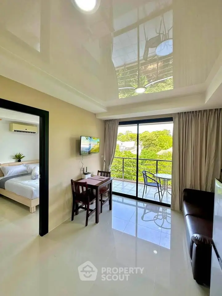 Modern living room with balcony view in a stylish apartment