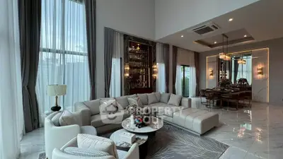 Luxurious modern living room with high ceilings and elegant decor