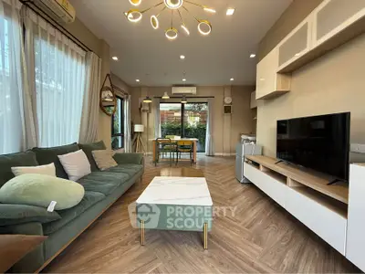 Spacious modern living room with stylish decor and natural light