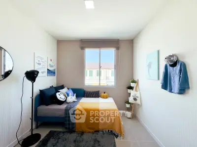 Charming bedroom with cozy decor and natural light, perfect for relaxation and comfort.