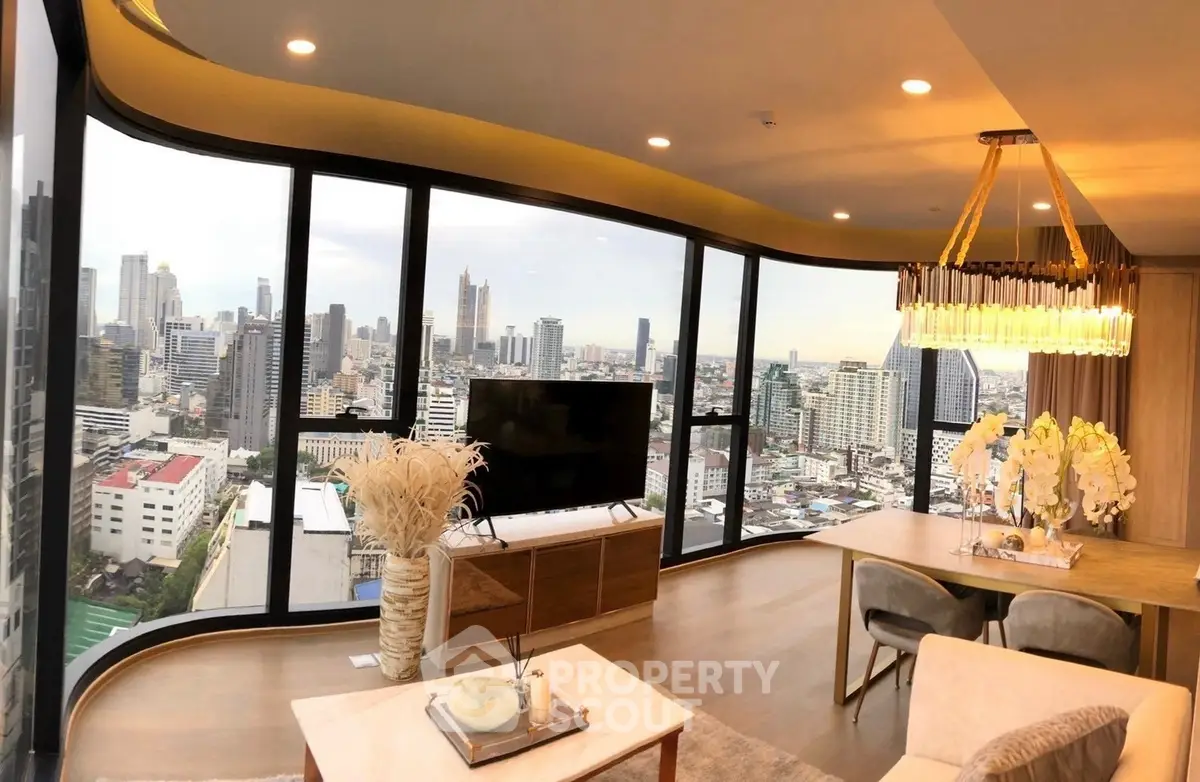 Luxurious high-rise living room with panoramic city views and elegant decor