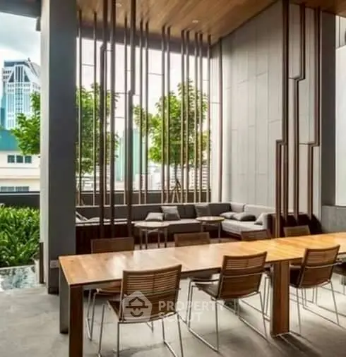 Modern open-concept living space with stylish furniture and city view