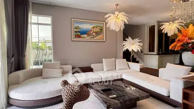 Luxurious living room with elegant decor and plush seating