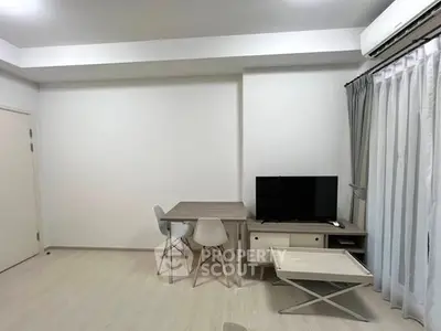 Modern minimalist living room with sleek furniture and natural light