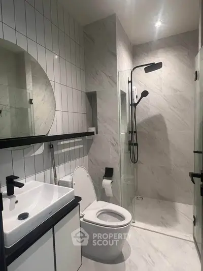 Modern bathroom with sleek fixtures and elegant marble tiles