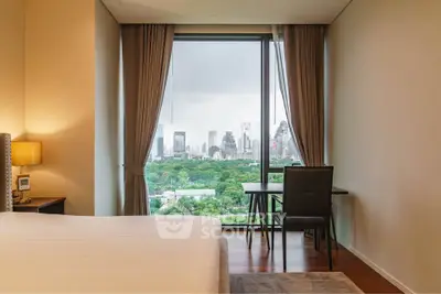Luxurious bedroom with stunning city view and elegant furnishings