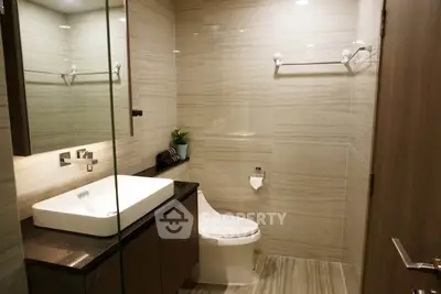 Modern bathroom with sleek fixtures and elegant tile design