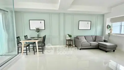 Modern living room with elegant dining area and stylish decor