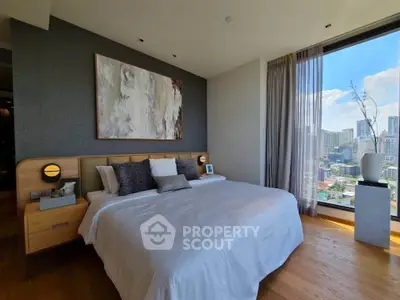 Luxurious bedroom with stunning city view and modern decor