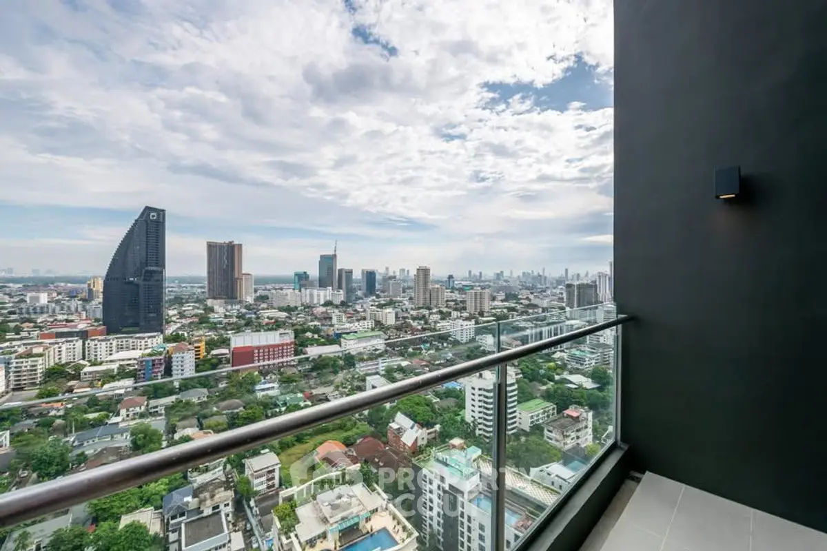 Stunning cityscape view from a modern high-rise balcony, perfect for urban living.
