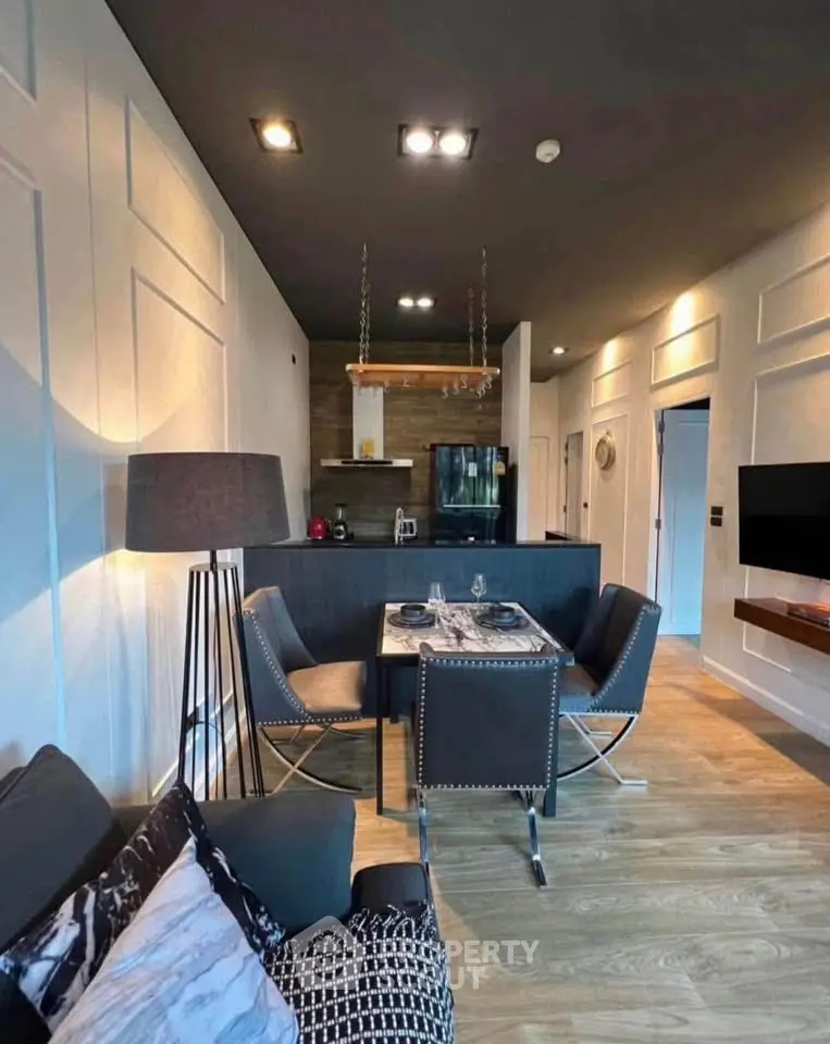 Modern living room with stylish dining area and open kitchen layout