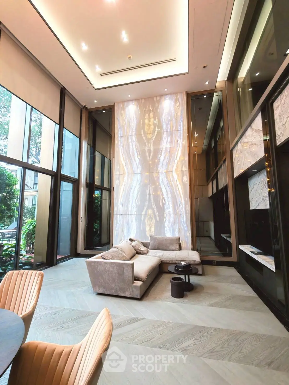Luxurious modern living room with high ceilings and elegant decor