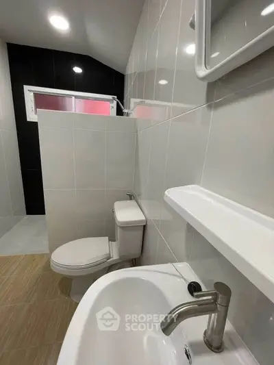 Modern bathroom with sleek fixtures and stylish tile design
